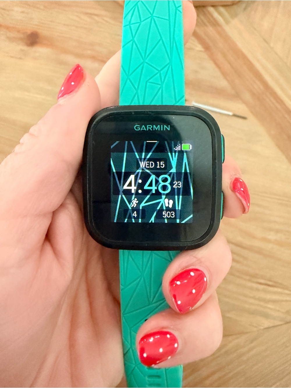 garmin Teal Silicone Strap Smartwatch with Black Face